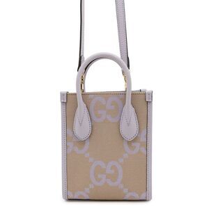 Gucci Canvas Brown Handbags